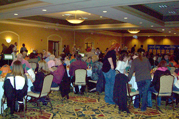 The crowd checking race results